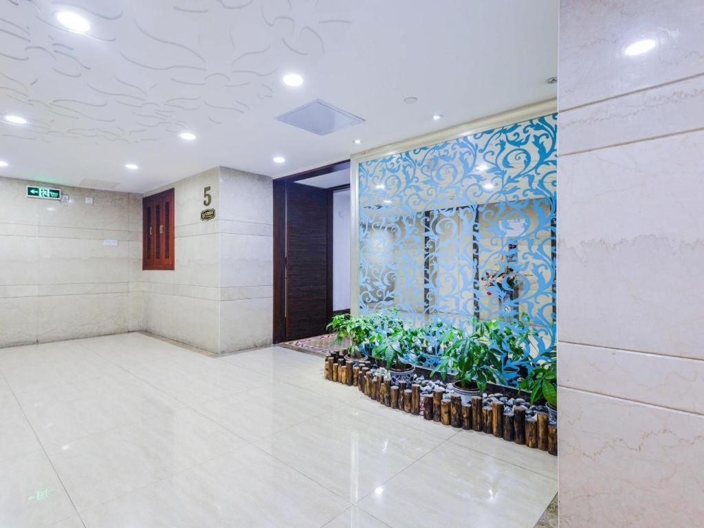 גואנגג'ואו New World Hotel מראה חיצוני תמונה