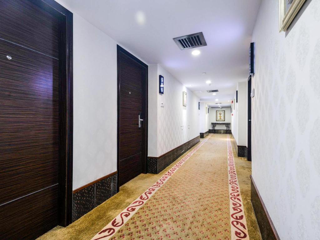 גואנגג'ואו New World Hotel מראה חיצוני תמונה